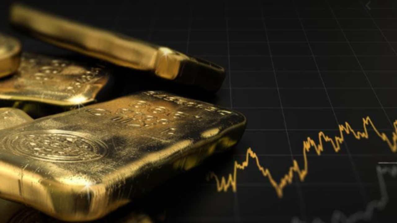 L'oro guadagna mentre il dollaro si ferma; gli operatori guardano agli spunti della Fed
